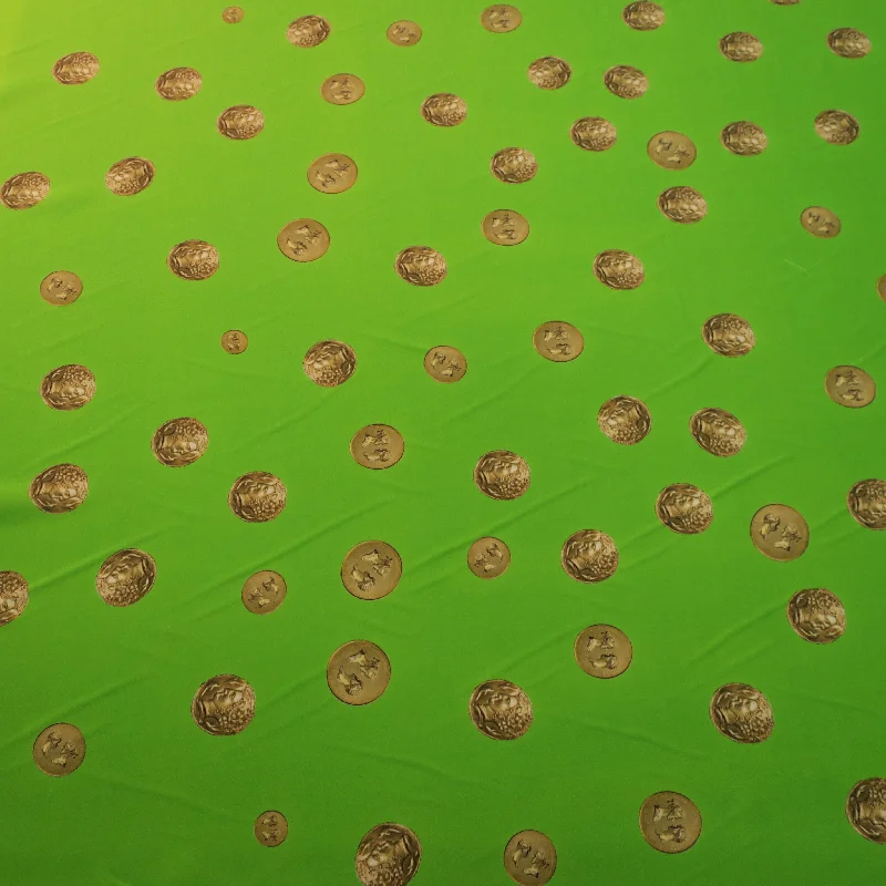 While Supplies Last Gold Coins in a Light Lime Background China Silk Fabric
