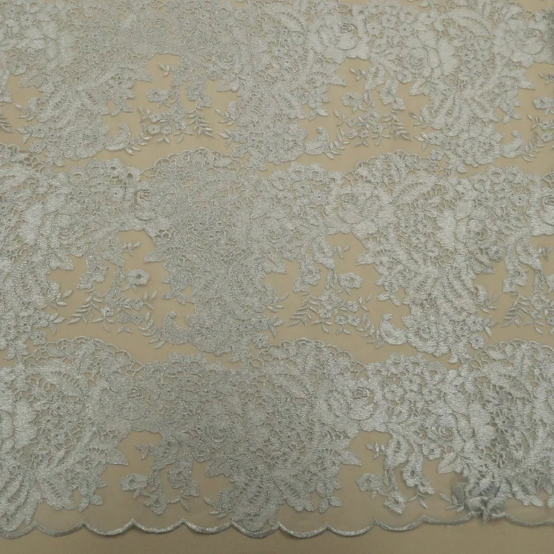 Midnight Madness Silver Floral Corded with Lurex Thread Double Scalloped Embroidered Tulle Fabric Midnight Madness Silver Floral Corded with Lurex Thread Double Scalloped Embroidered Tulle Fabric