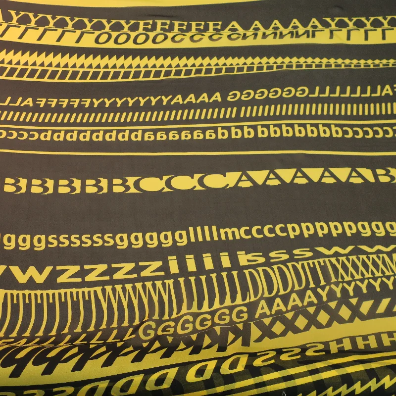 Deal of the Week Yellow Letters on a Black Background Printed Silk Chiffon Fabric